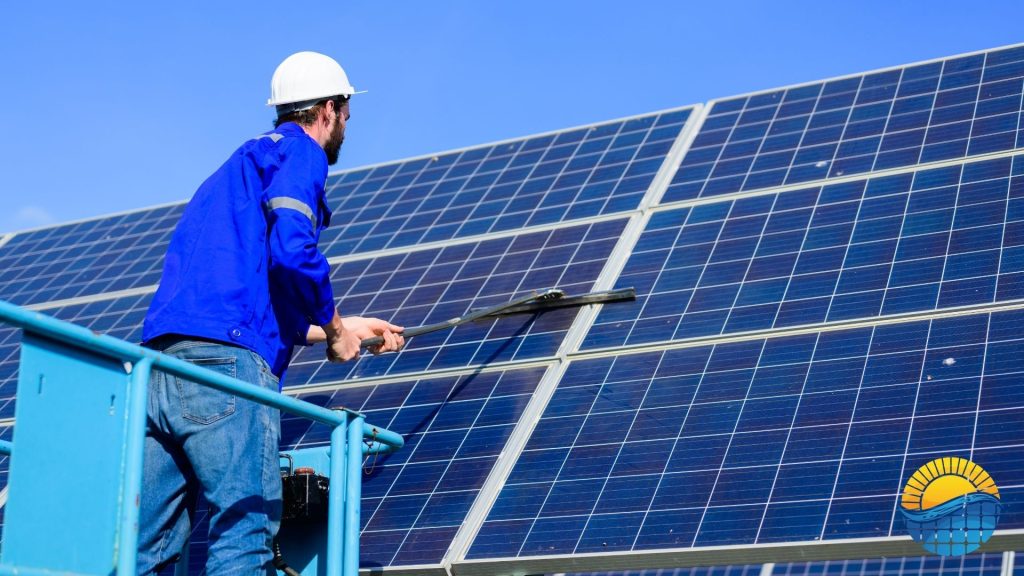 A person is cleaning solar panels on a roof (1)