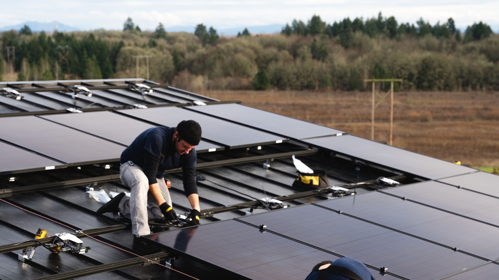 Crew on a metal roof, Portland metro